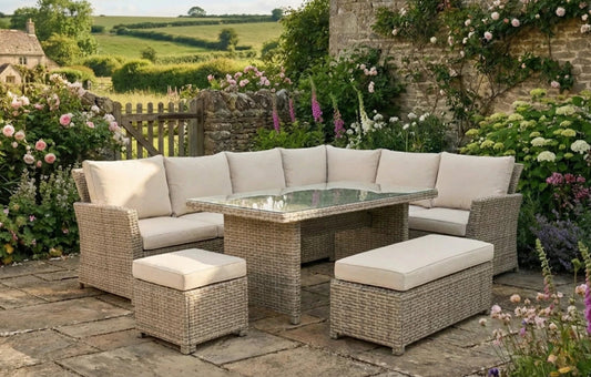 Outdoor seating with rattan furniture set in a lush garden patio, ideal for relaxation and gatherings.